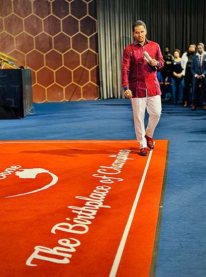 Prophet walking on the Birthplace of Champions Carpet